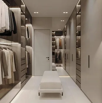 Walk-in dressing room featuring pull-out racks and hampers, Honolulu home