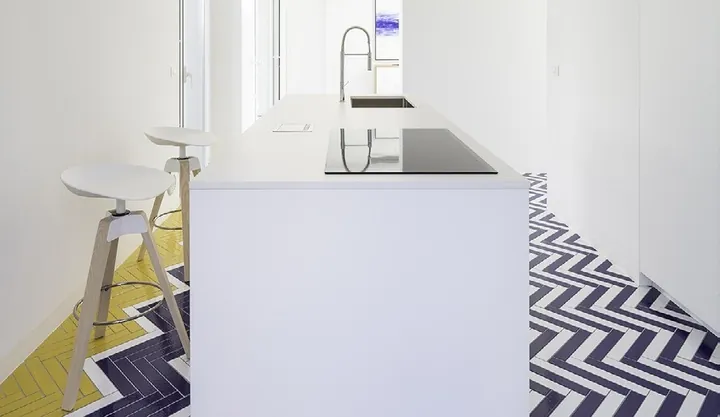 Custom kitchen cabinets featuring walnut accents and soft-close drawers, Oahu custom installation