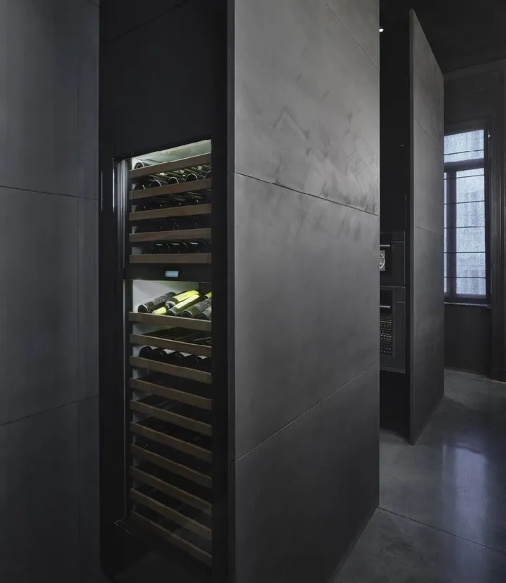 Minimalist kitchen design with porcelain countertops and tall storage walls, Hawaii residence