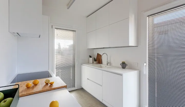 Open-plan kitchen with full-height pantry and panel-ready refrigeration, Hawaii residence