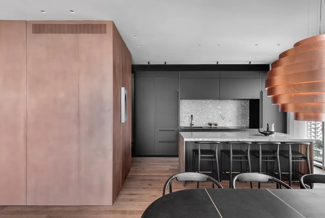Handleless modern kitchen featuring slab-front cabinetry and under-cabinet LED lighting, Oahu custom installation