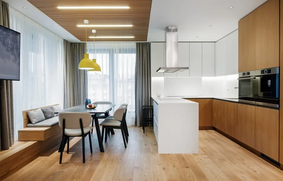 Handleless modern kitchen featuring slab-front cabinetry and under-cabinet LED lighting, Oahu custom installation