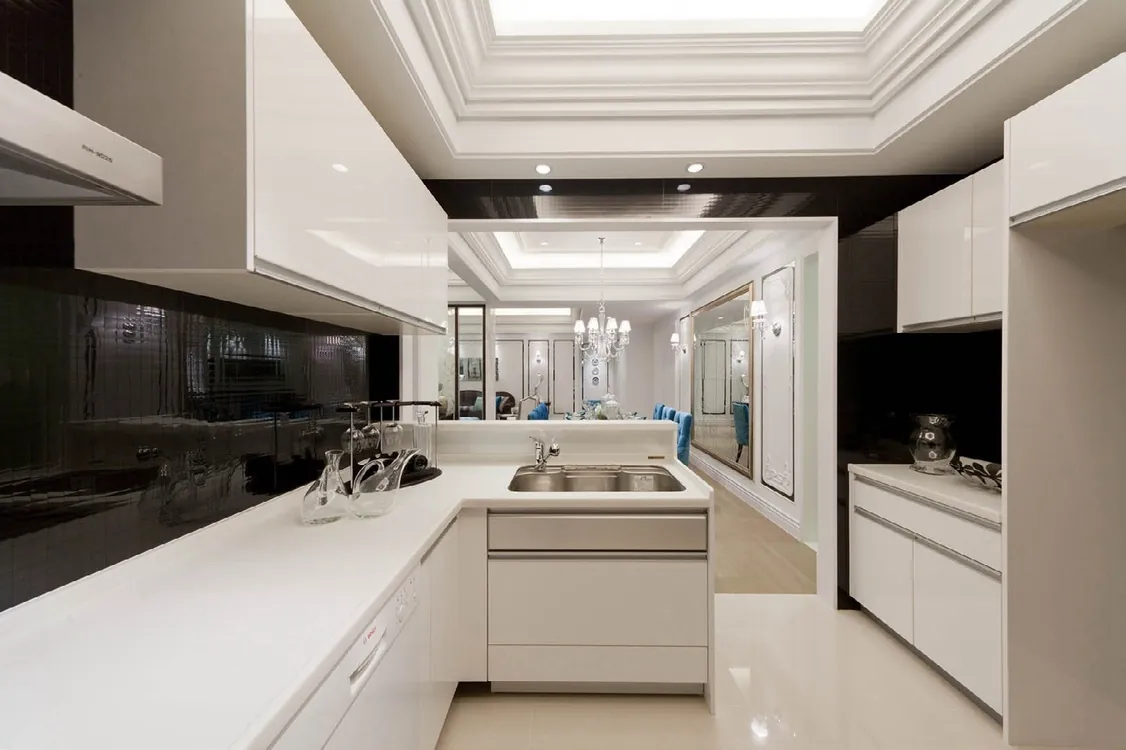 Luxury Oahu kitchen with custom hood, gas cooktop, and prep sink, Honolulu home