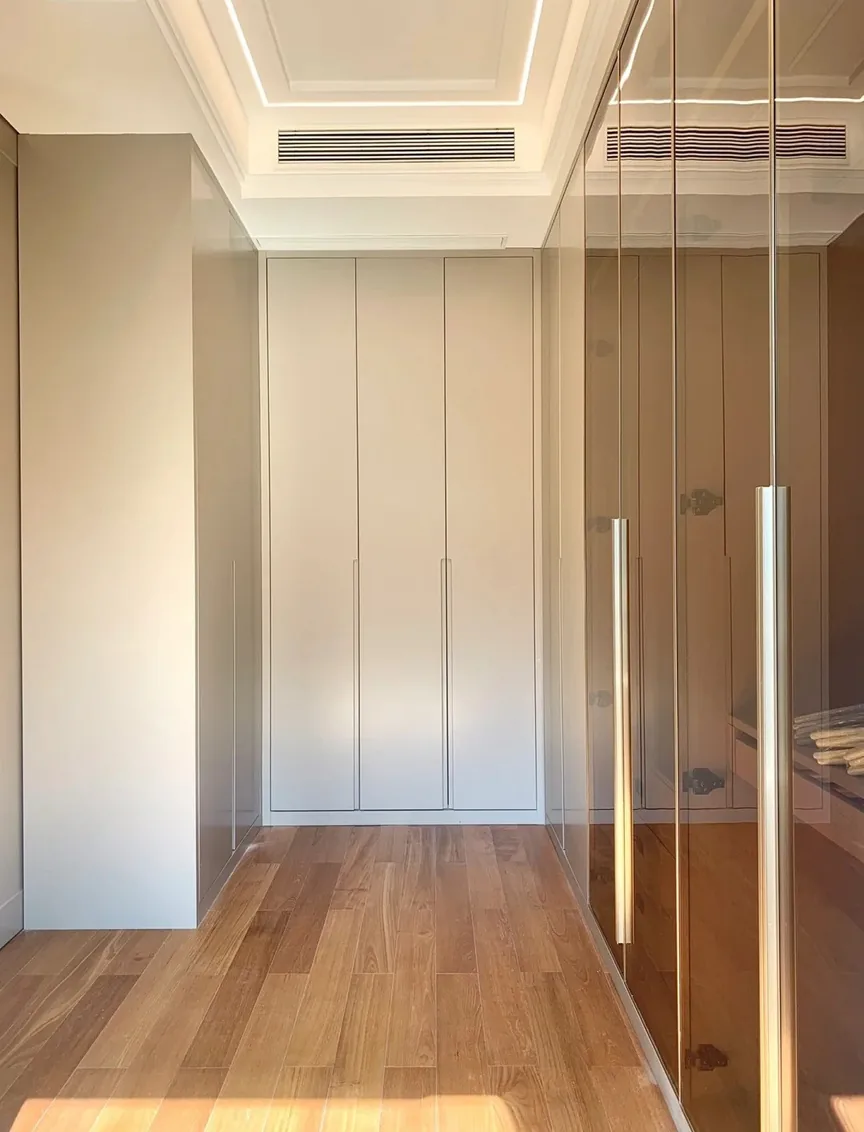 Custom bedroom storage with matte and wood-grain finishes, Kapolei showroom display