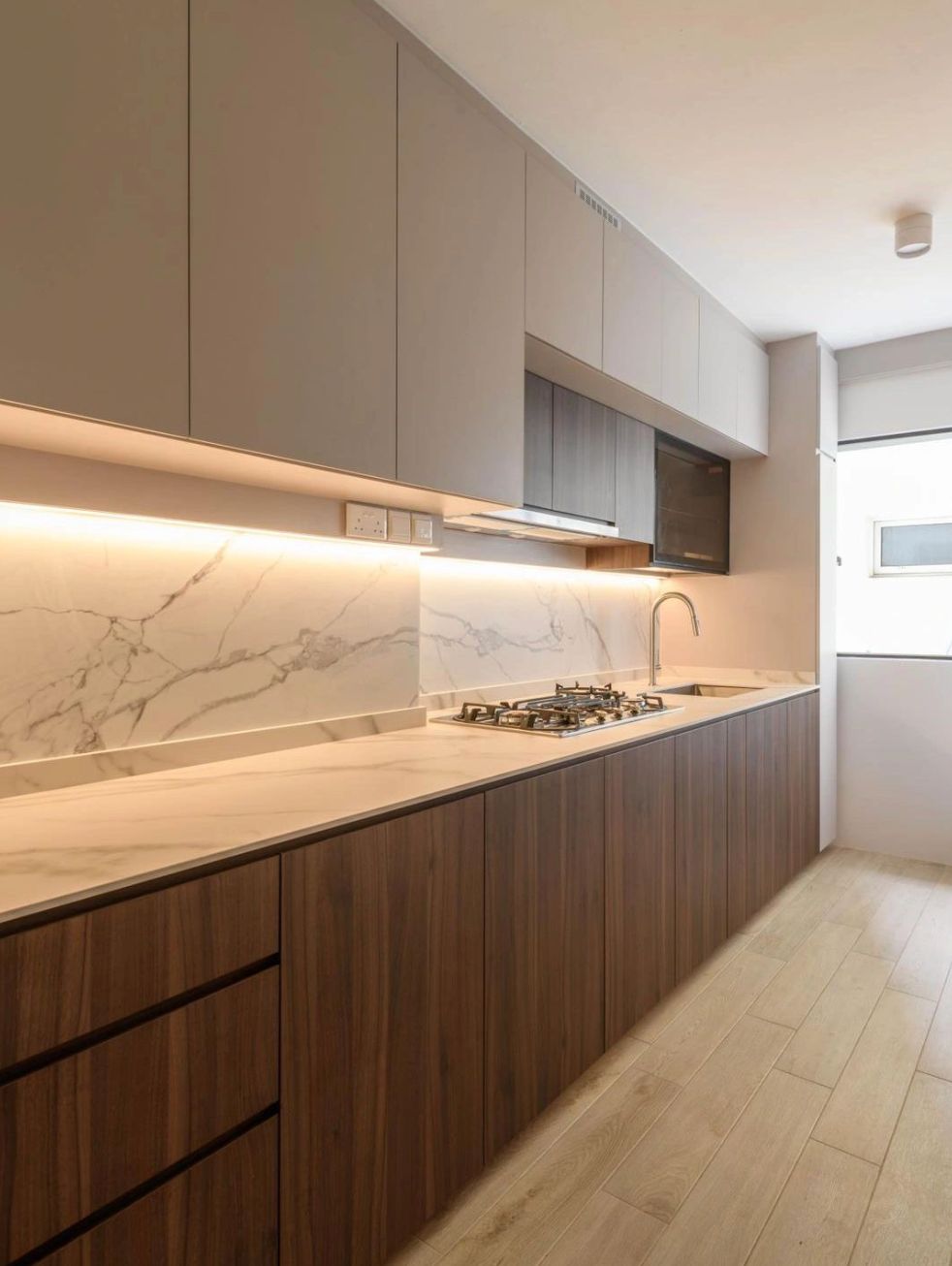 Walnut and marble galley kitchen — Ala Moana, O'ahu