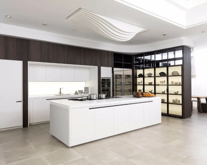 Custom kitchen cabinets featuring walnut accents and soft-close drawers, Oahu custom installation