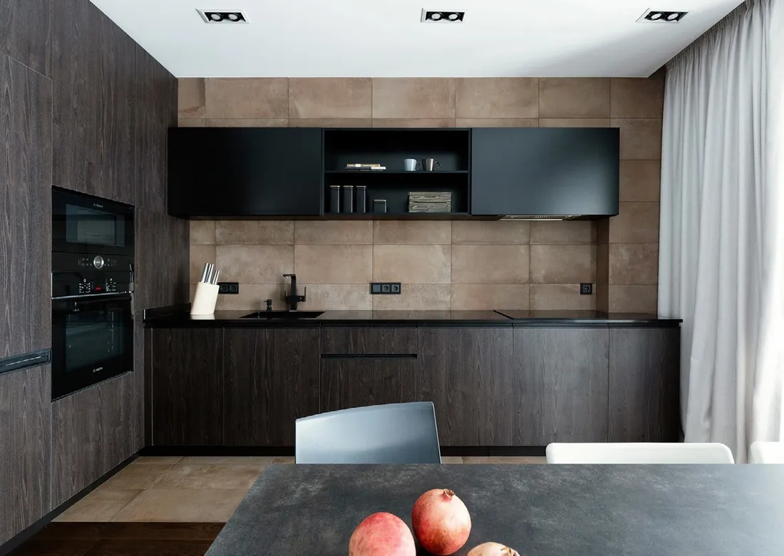 Handleless modern kitchen featuring slab-front cabinetry and under-cabinet LED lighting, Oahu custom installation