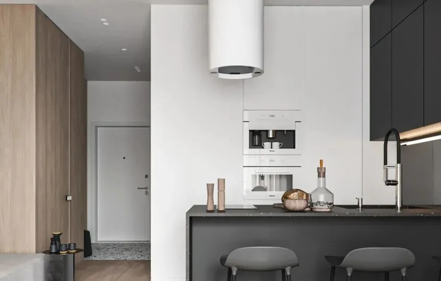 Modern custom kitchen with quartz waterfall island and integrated appliances, Oahu showroom