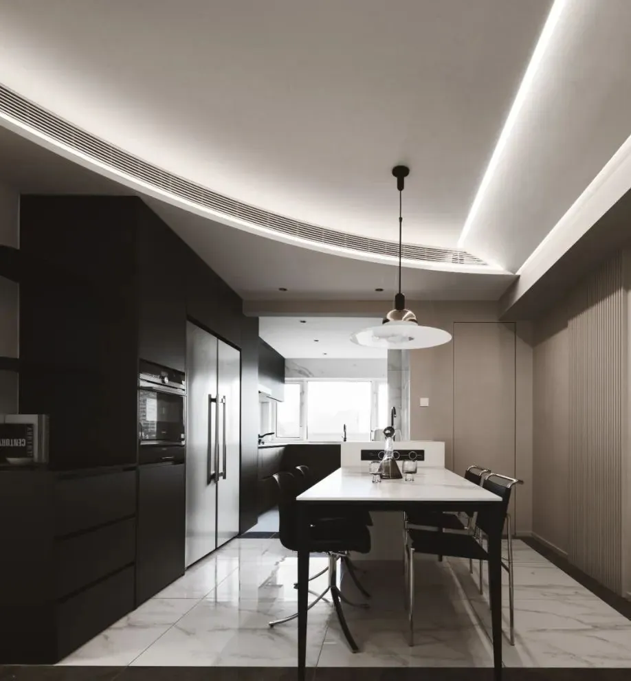 Handleless modern kitchen featuring slab-front cabinetry and under-cabinet LED lighting, Oahu custom installation