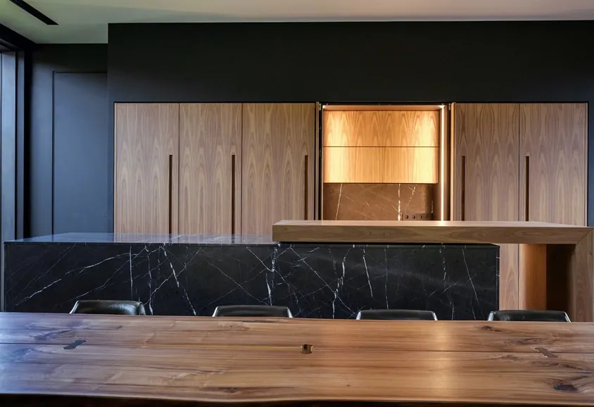 Transitional Hawaii kitchen featuring a marble-look backsplash and integrated dining, Honolulu home