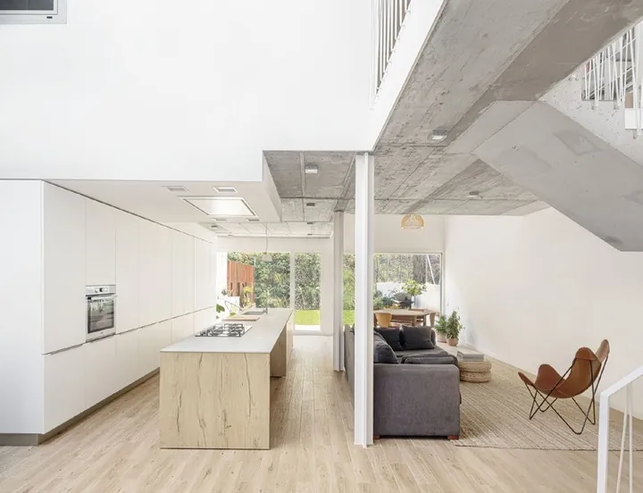 Minimalist kitchen design with porcelain countertops and tall storage walls, Hawaii residence
