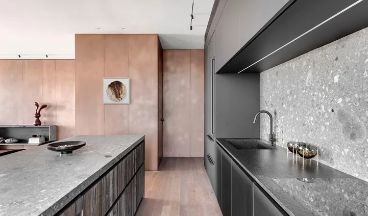 Luxury Oahu kitchen with custom hood, gas cooktop, and prep sink, Honolulu home