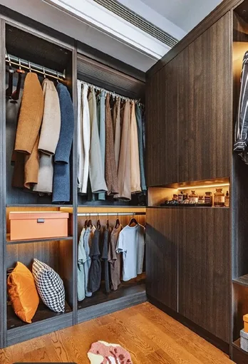 Reach-in wardrobe with glass-front cabinetry, Kapolei showroom display