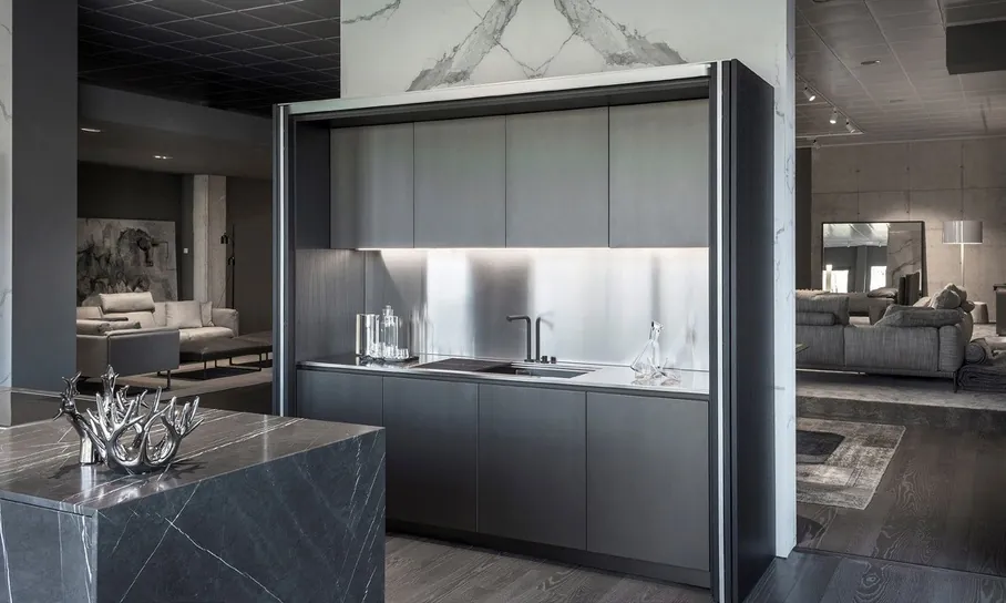Island kitchen design with breakfast bar seating and pendant lighting, Oahu showroom