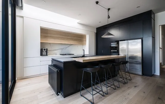 Contemporary kitchen design featuring a stone backsplash and matte finishes, Kapolei showroom display