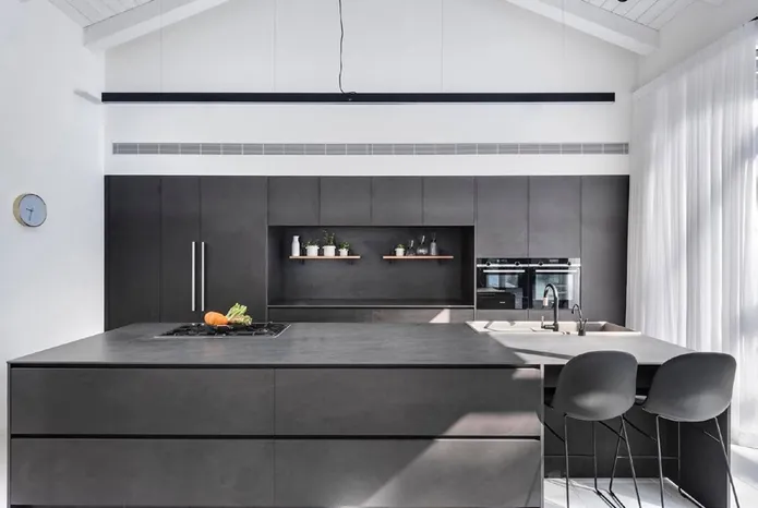Open-plan kitchen with full-height pantry and panel-ready refrigeration, Hawaii residence