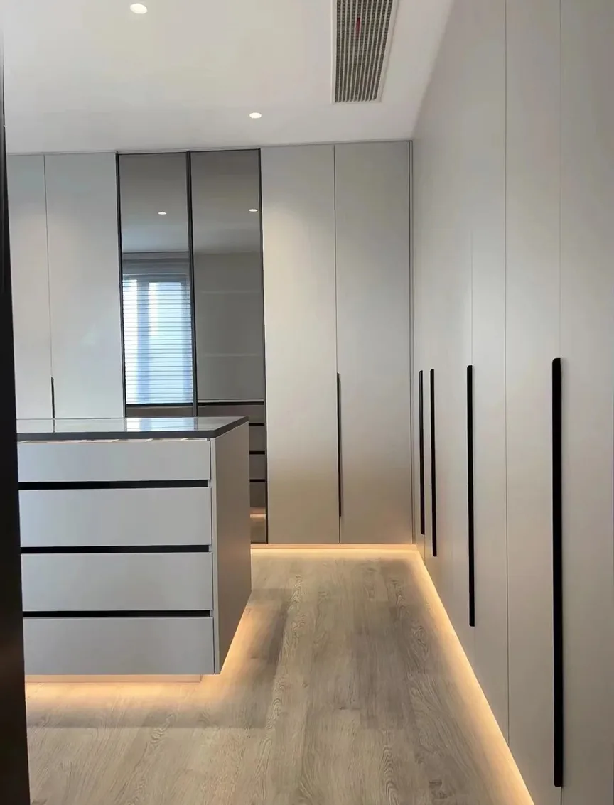 Closet organization system with island and seated dressing area, Hawaii residence