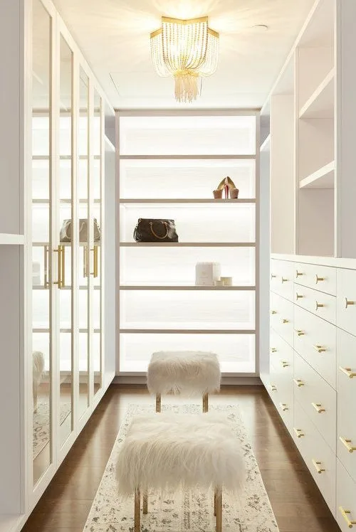 Closet organization system with island and seated dressing area, Hawaii residence