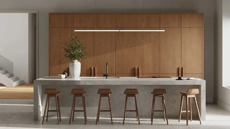 Island kitchen design with breakfast bar seating and pendant lighting, Oahu showroom