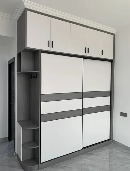 Reach-in wardrobe with glass-front cabinetry, Kapolei showroom display