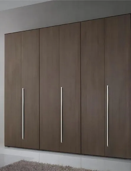 Custom bedroom storage with matte and wood-grain finishes, Kapolei showroom display
